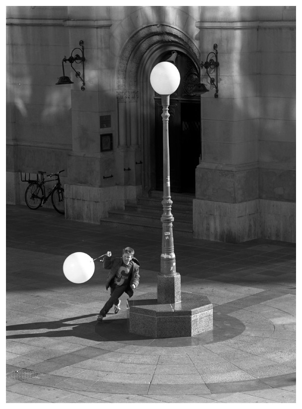 A Boy with White Balloon