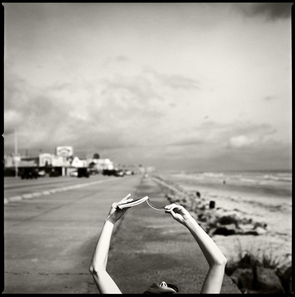 Kenny Braun Reading on the Seawall