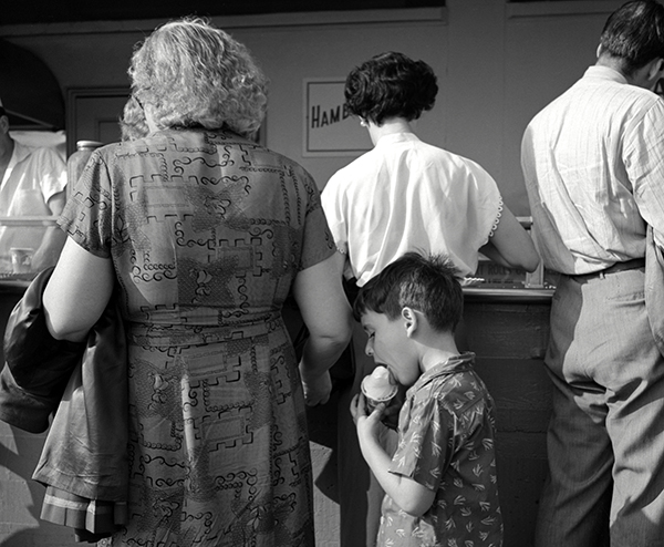 Martin Elkort, Eating a Mel-o-Roll Ice Cream Cone, Coney Island Boardwalk, 1951